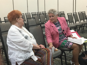 Peggy Aime and Genevieve Gordon chat before the Foundation Board Meeting